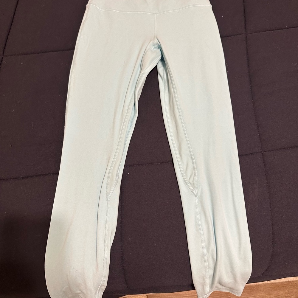 Light Cream Full Length Leggings with Soft Knit Fabric and Form Fitting Design
